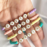 Pulsera Pucas Letra Dorada